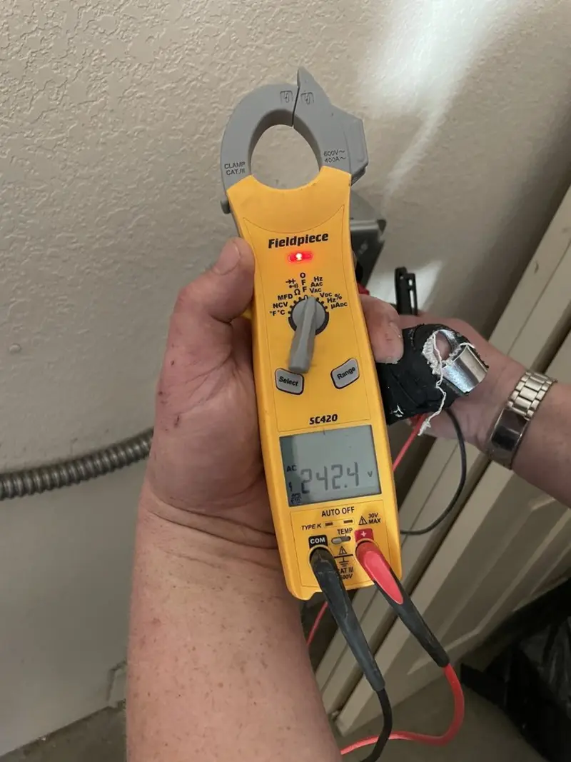 Voltage testing with clamp meter during Aluminum Wiring Replacement in Highwood